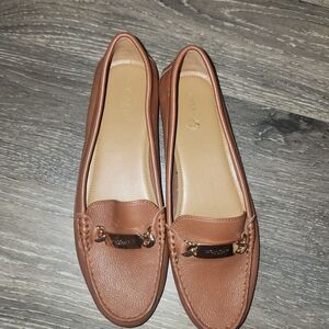 Coach Brown Leather Flats with Classic Slip-On Design